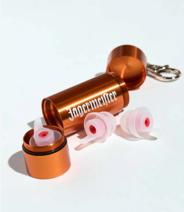 Earplugs, an orange metal case with a white Jägermeister wordmork on it  in a white background