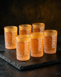 Set de seis vasos Jägermeister naranjas con el texto 'ORANGE'