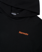 Black hoodie with Jägermeister logo on the chest